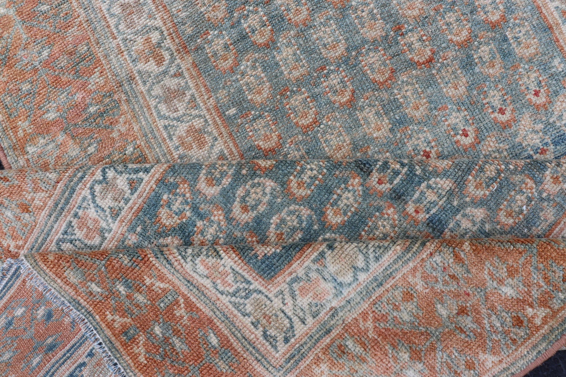 Paisley Field Antique Persian Kurdish Runner in Soft Teal Colors & Orange Variation of teal colors , creams, and soft oranges antique Persian Kurdish runner /rug EMB - 9534 - 02 - P13033, country of origin / type: Iran / Kurdish, circa 1910. ... - Keivan Woven ArtsEMB - 9534 - 02 - P13033 - 14722Rug
