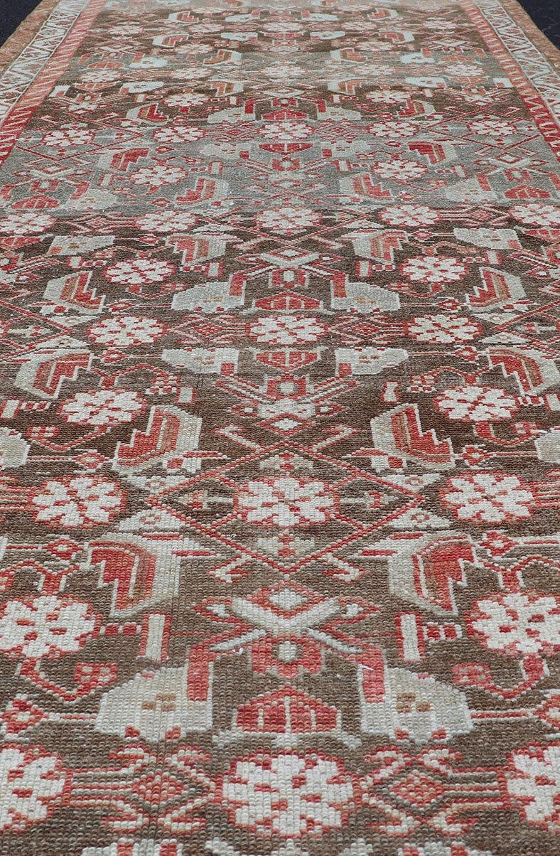 Antique Persian Malayer with Sub - Geometric Floral Design in Reds & Earthy Tones This antique Persian Malayer Runner features a sub - geometric floral design with a complementary multi - tiered border. The runner is rendered in red and earthy tones ... - Keivan Woven ArtsEMB - 9535 - 01 - 14728Rug
