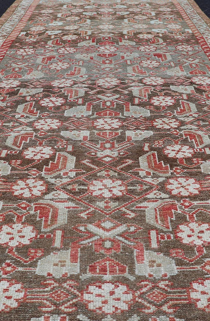 Antique Persian Malayer with Sub - Geometric Floral Design in Reds & Earthy Tones This antique Persian Malayer Runner features a sub - geometric floral design with a complementary multi - tiered border. The runner is rendered in red and earthy tones ... - Keivan Woven ArtsEMB - 9535 - 01 - 14728Rug