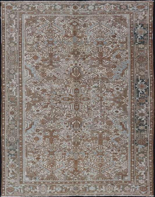 Vintage Hand - Knotted Heriz Rug with Sub - Geometric Design in Natural Tones This vintage hand - knotted Persian Heriz rug features an all - over sub - geometric design, enclosed within a complementary, multi - tiered border. The rug is rendered in blues... - Keivan Woven ArtsEMB - 9540 - P13089 - 14758Rug