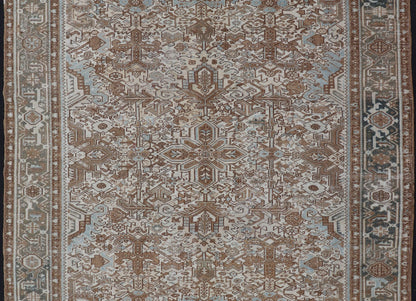 Vintage Hand - Knotted Heriz Rug with Sub - Geometric Design in Natural Tones This vintage hand - knotted Persian Heriz rug features an all - over sub - geometric design, enclosed within a complementary, multi - tiered border. The rug is rendered in blues... - Keivan Woven ArtsEMB - 9540 - P13089 - 14758Rug