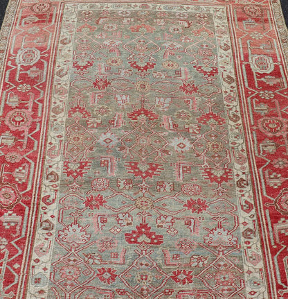Antique Persian Bidjar long Rug with Geometric Herati Design in Light Green and Red. Herati design distressed Bidjar antique Persian rug in a variety of green, taupe green background and soft red border , rug EMB - 9542 - P13037 - 05, country of orig... - Keivan Woven ArtsEMB - 9542 - P13037 - 05 - 14776Rug