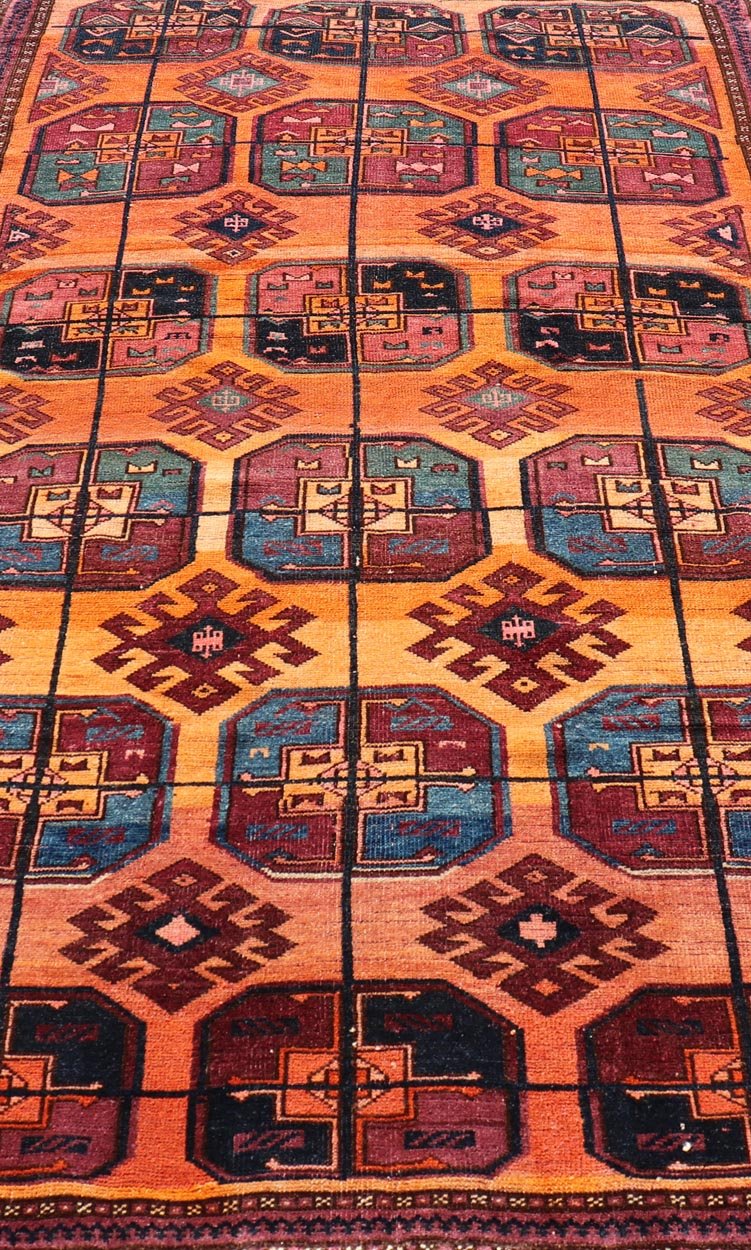 Measures: 5'0 x 8'10 Vintage Wool Ersari Rug in Wool with Gul Design in Orange, Blue, and Brown. Keivan Woven Arts; rug EMB - 9543 - 13058, country of origin / type: Turkestan / Ersari, circa 1930s. This Turkomen Ersari rug has been hand - knotted... - Keivan Woven ArtsEMB - 9543 - 13058 - 14782Rug