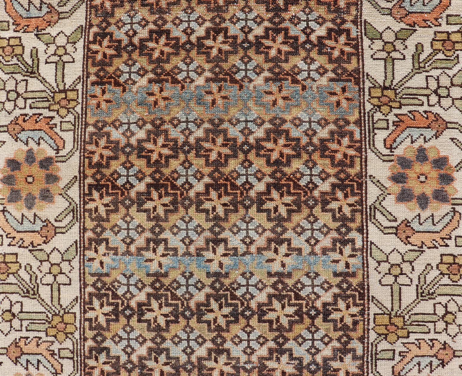 Colorful Antique Persian Bakhtiari Runner with All - Over Floral and Tribal Border Antique Hand Knotted Bakhtiari Runner from Persia with multicolored all - over floral and geometric design, Keivan Woven Arts / rug EMB - 9545 - P13074, country of origin... - Keivan Woven ArtsEMB - 9545 - P13074 - 14794Rug