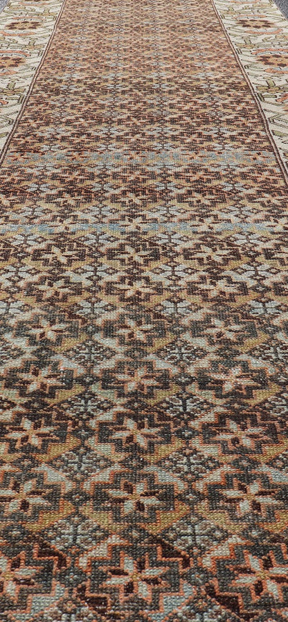 Colorful Antique Persian Bakhtiari Runner with All - Over Floral and Tribal Border Antique Hand Knotted Bakhtiari Runner from Persia with multicolored all - over floral and geometric design, Keivan Woven Arts / rug EMB - 9545 - P13074, country of origin... - Keivan Woven ArtsEMB - 9545 - P13074 - 14794Rug