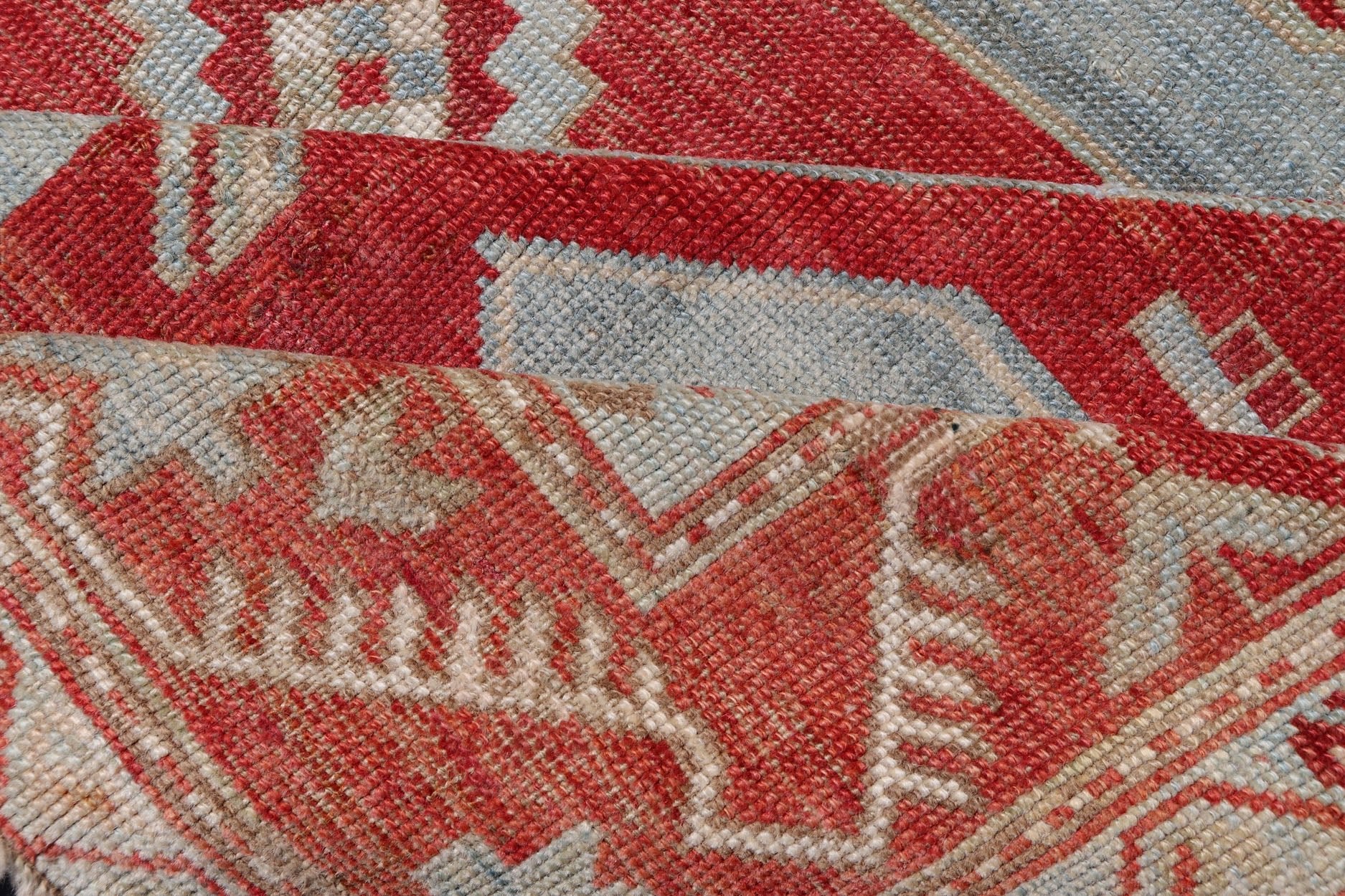 Antique Caucasian Kazak Rug with Tribal Geometric Medallion In Red. light green, ivory & Lt. Blue. Tribal geometric with stretched medallion design antique Kazak rug, antique rug from Caucasus Region in multi - colors. Keivan Woven Arts / rug EMB - ... - Keivan Woven ArtsEMB - 9552 - P13035 - 14818Rug