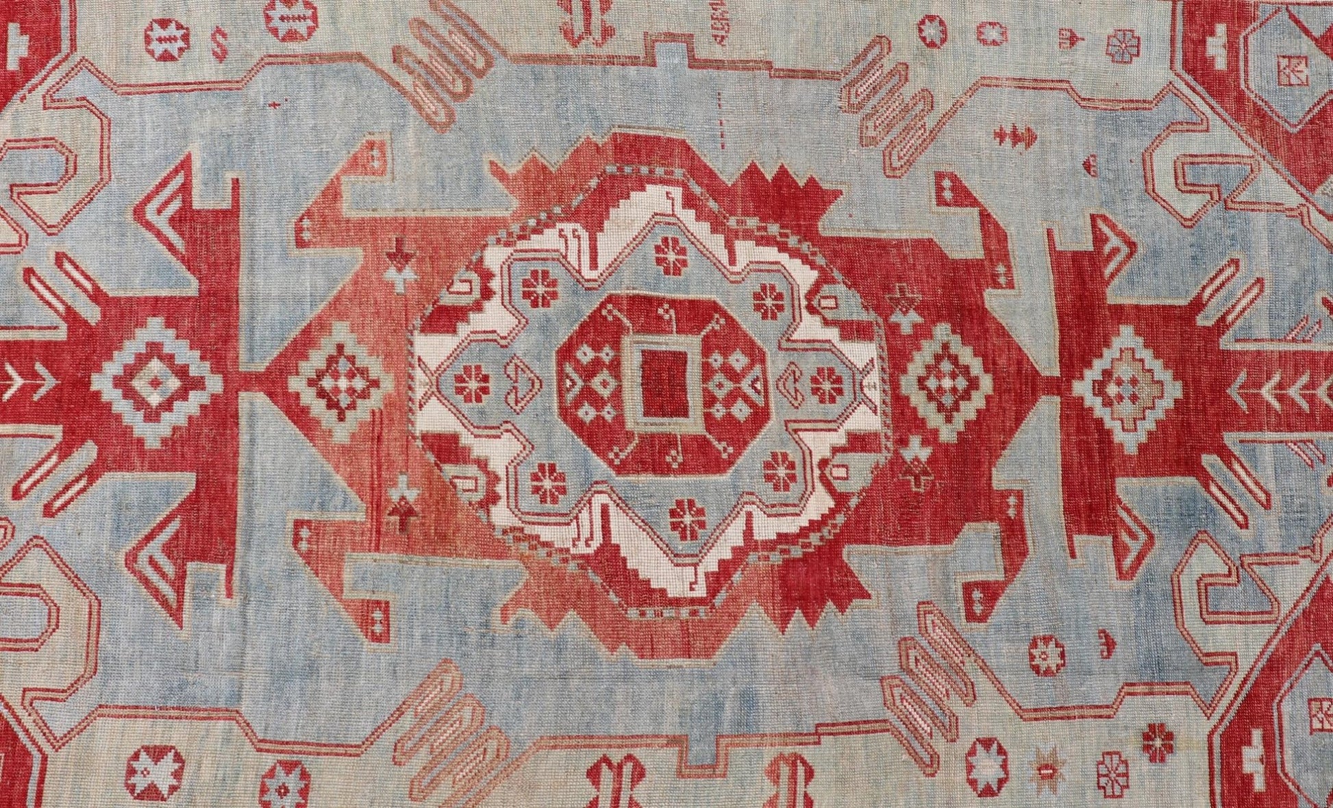 Antique Caucasian Kazak Rug with Tribal Geometric Medallion In Red. light green, ivory & Lt. Blue. Tribal geometric with stretched medallion design antique Kazak rug, antique rug from Caucasus Region in multi - colors. Keivan Woven Arts / rug EMB - ... - Keivan Woven ArtsEMB - 9552 - P13035 - 14818Rug