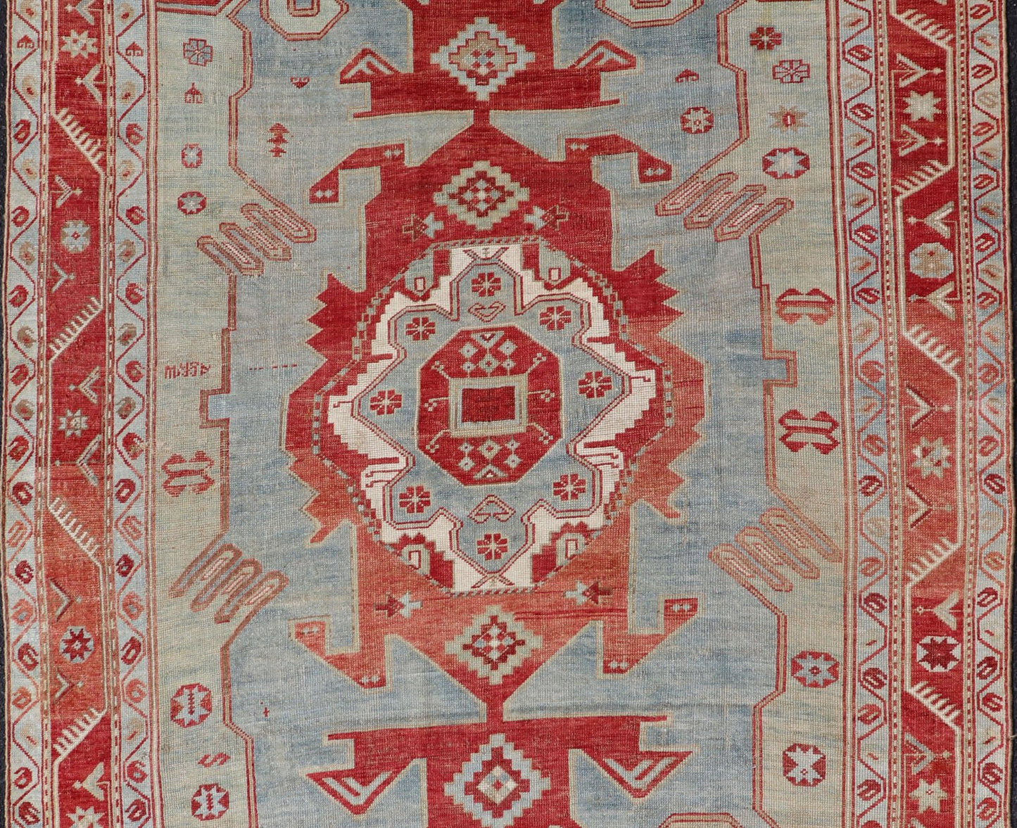 Antique Caucasian Kazak Rug with Tribal Geometric Medallion In Red. light green, ivory & Lt. Blue. Tribal geometric with stretched medallion design antique Kazak rug, antique rug from Caucasus Region in multi - colors. Keivan Woven Arts / rug EMB - ... - Keivan Woven ArtsEMB - 9552 - P13035 - 14818Rug