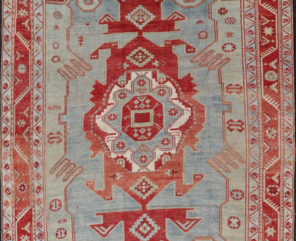 Antique Caucasian Kazak Rug with Tribal Geometric Medallion In Red. light green, ivory & Lt. Blue. Tribal geometric with stretched medallion design antique Kazak rug, antique rug from Caucasus Region in multi - colors. Keivan Woven Arts / rug EMB - ... - Keivan Woven ArtsEMB - 9552 - P13035 - 14818Rug