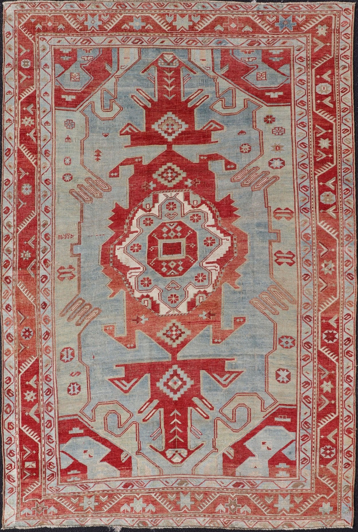 Antique Caucasian Kazak Rug with Tribal Geometric Medallion In Red. light green, ivory & Lt. Blue. Tribal geometric with stretched medallion design antique Kazak rug, antique rug from Caucasus Region in multi - colors. Keivan Woven Arts / rug EMB - ... - Keivan Woven ArtsEMB - 9552 - P13035 - 14818Rug