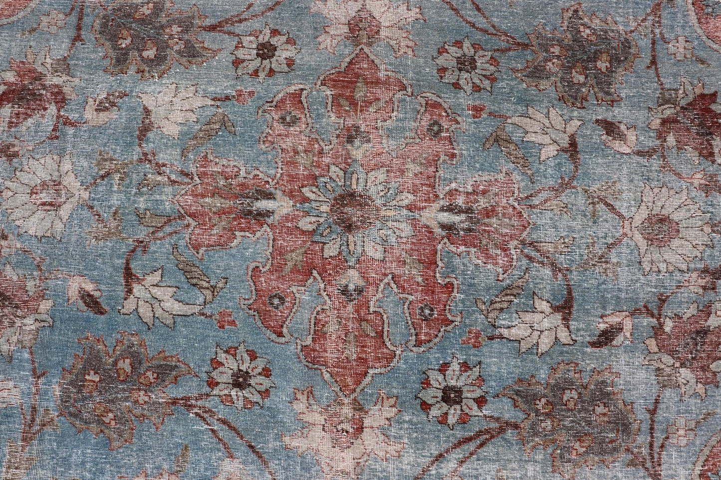 Hand - Knotted Antique Persian Tabriz Khoy Rug in Wool with Large Floral Design This antique Persian Tabriz Khoy rug features an all - over sub - geometric floral design rendered in multicolor, set upon a red background. A complementary, multi - tiered... - Keivan Woven ArtsEMB - 9556 - P13091 - 14868Rug