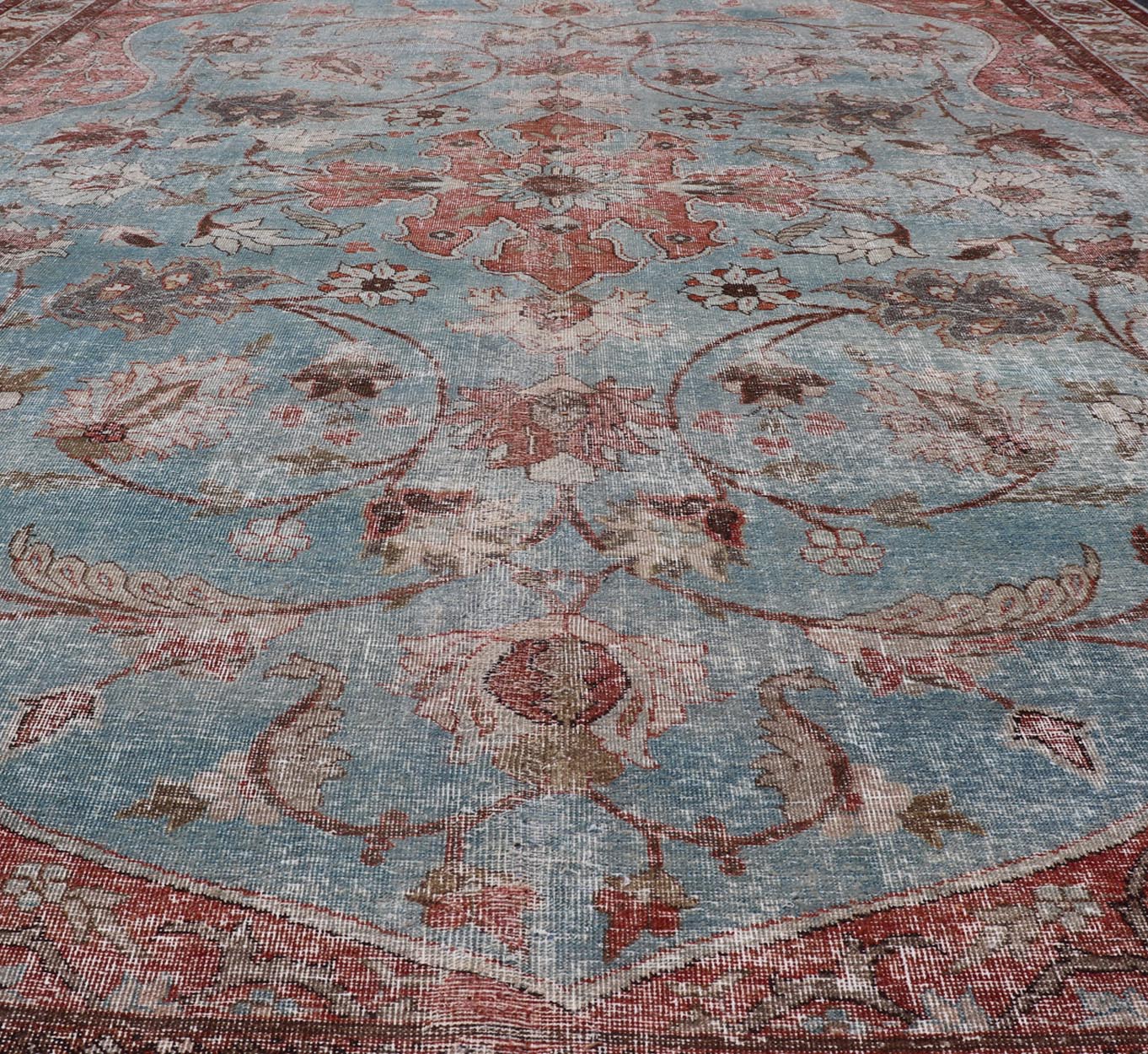 Hand - Knotted Antique Persian Tabriz Khoy Rug in Wool with Large Floral Design This antique Persian Tabriz Khoy rug features an all - over sub - geometric floral design rendered in multicolor, set upon a red background. A complementary, multi - tiered... - Keivan Woven ArtsEMB - 9556 - P13091 - 14868Rug