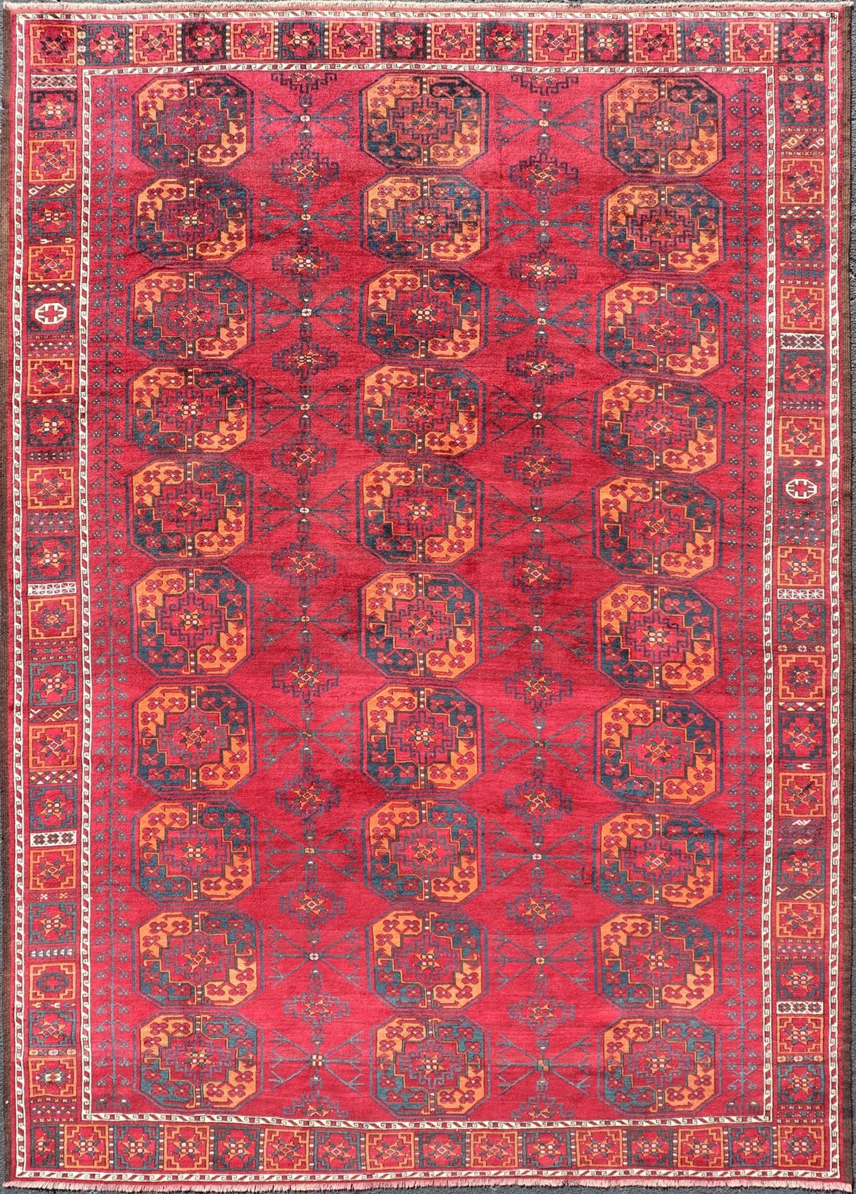 Antique Ersari Rug in Wool with Gul Design in Ivory, Blue, Red and Orange This Turkomen Ersari rug has been hand - knotted in the finest wool. The rug features an all - over repeating sub - geometric Gul design throughout the entirety of the rug, encl... - Keivan Woven ArtsEMB - 9559 - P13502 - 14880Rug