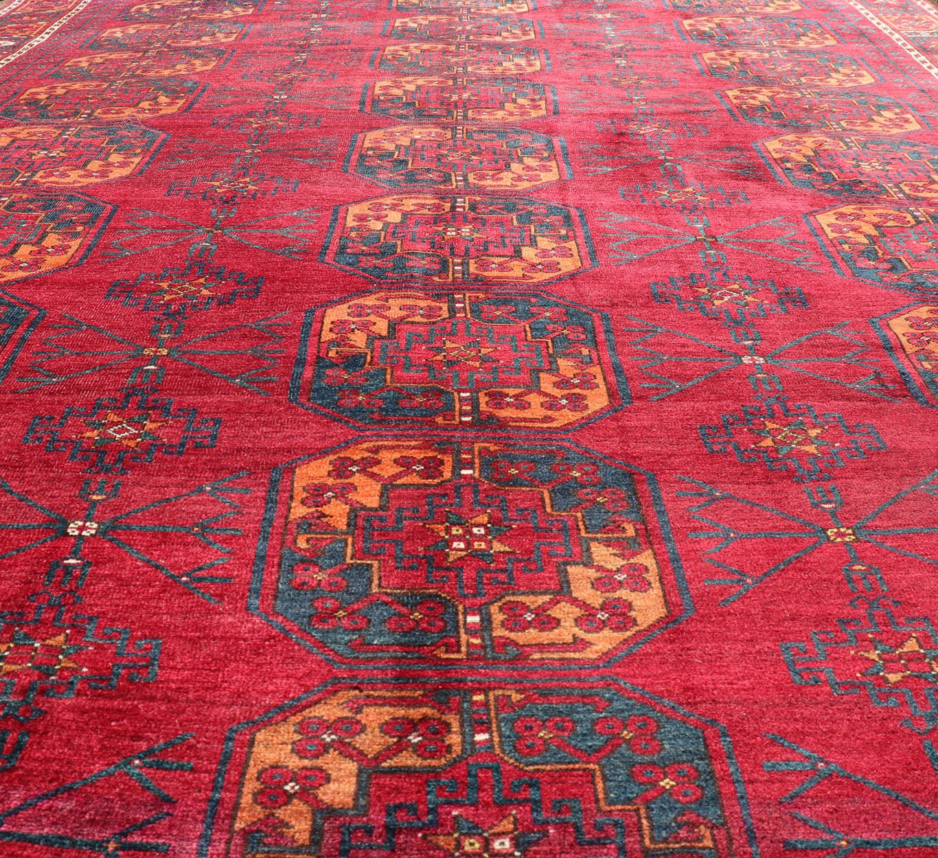 Antique Ersari Rug in Wool with Gul Design in Ivory, Blue, Red and Orange This Turkomen Ersari rug has been hand - knotted in the finest wool. The rug features an all - over repeating sub - geometric Gul design throughout the entirety of the rug, encl... - Keivan Woven ArtsEMB - 9559 - P13502 - 14880Rug