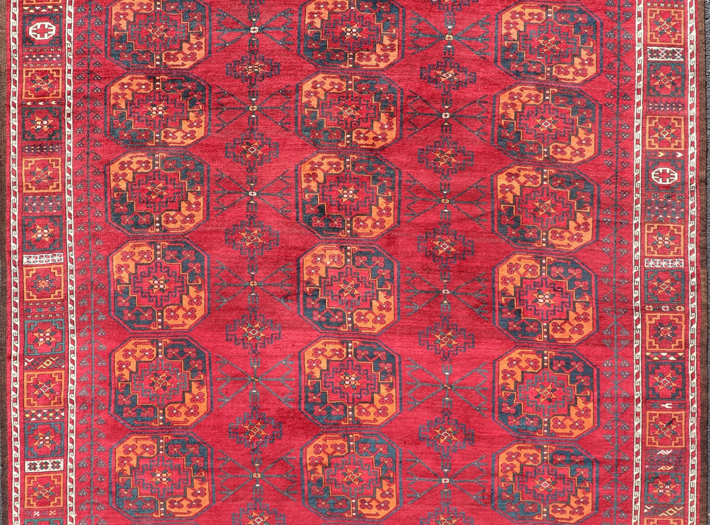 Antique Ersari Rug in Wool with Gul Design in Ivory, Blue, Red and Orange This Turkomen Ersari rug has been hand - knotted in the finest wool. The rug features an all - over repeating sub - geometric Gul design throughout the entirety of the rug, encl... - Keivan Woven ArtsEMB - 9559 - P13502 - 14880Rug