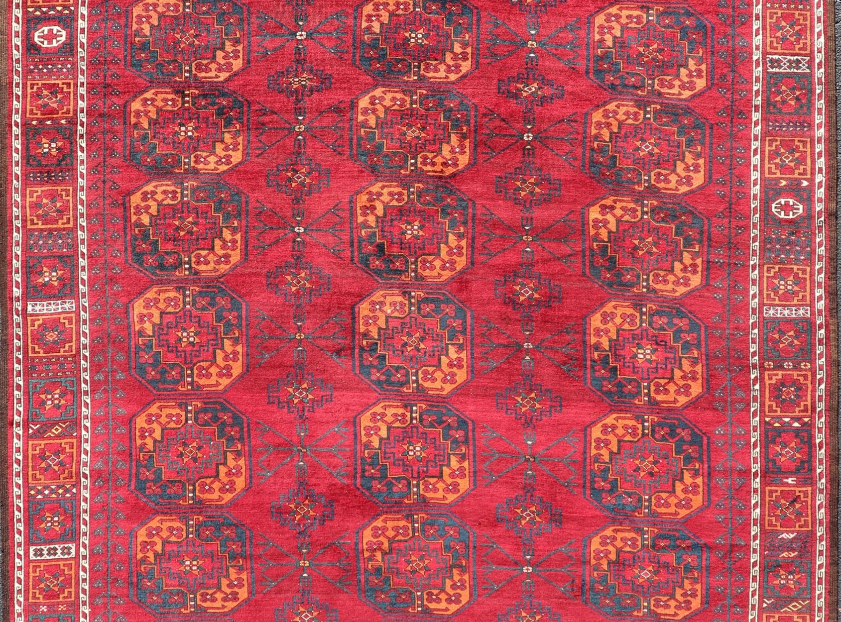 Antique Ersari Rug in Wool with Gul Design in Ivory, Blue, Red and Orange This Turkomen Ersari rug has been hand - knotted in the finest wool. The rug features an all - over repeating sub - geometric Gul design throughout the entirety of the rug, encl... - Keivan Woven ArtsEMB - 9559 - P13502 - 14880Rug