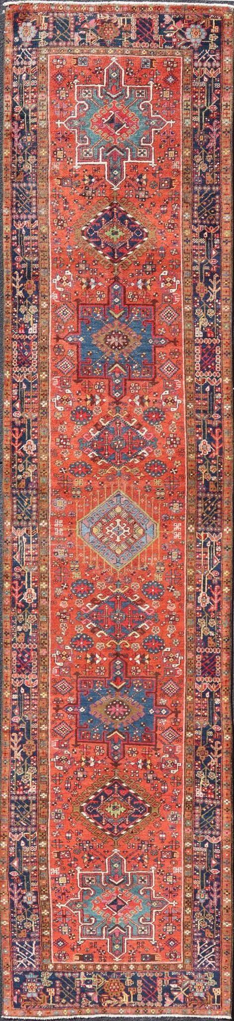 Very Long antique Persian Heriz runner with geometric medallion design in red, blue and colorful tones. Keivan Woven Arts / rug EMB - 9560 - P13076 , country of origin / type: Iran / Heriz, circa 1900 Measures:3'4 x 14'4 Antique Hand Knotted ... - Keivan Woven ArtsEMB - 9560 - P13076 - 14568Rug