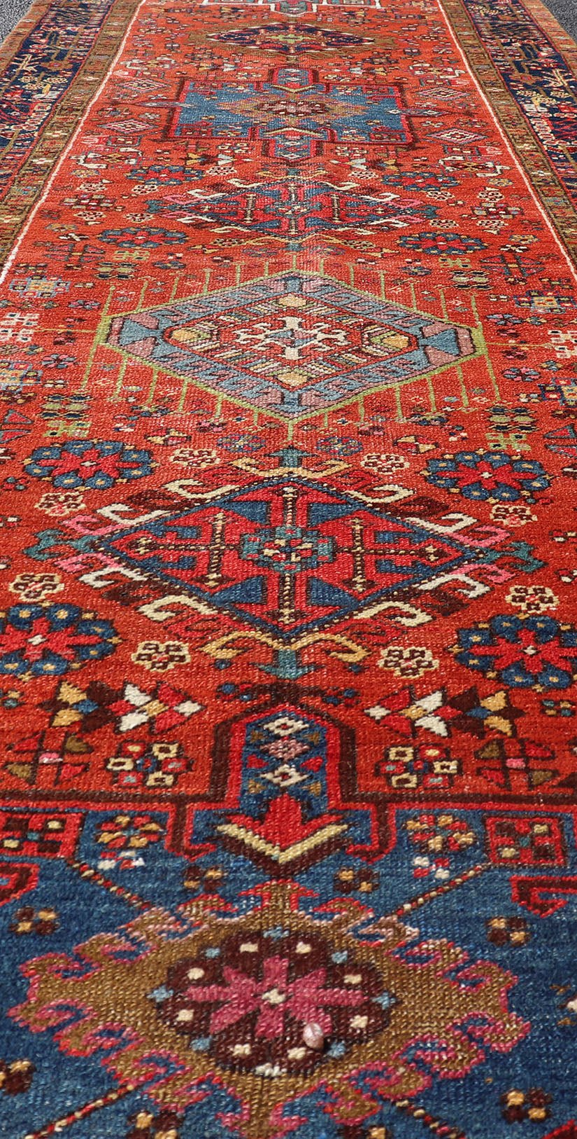 Very Long antique Persian Heriz runner with geometric medallion design in red, blue and colorful tones. Keivan Woven Arts / rug EMB - 9560 - P13076 , country of origin / type: Iran / Heriz, circa 1900 Measures:3'4 x 14'4 Antique Hand Knotted ... - Keivan Woven ArtsEMB - 9560 - P13076 - 14568Rug