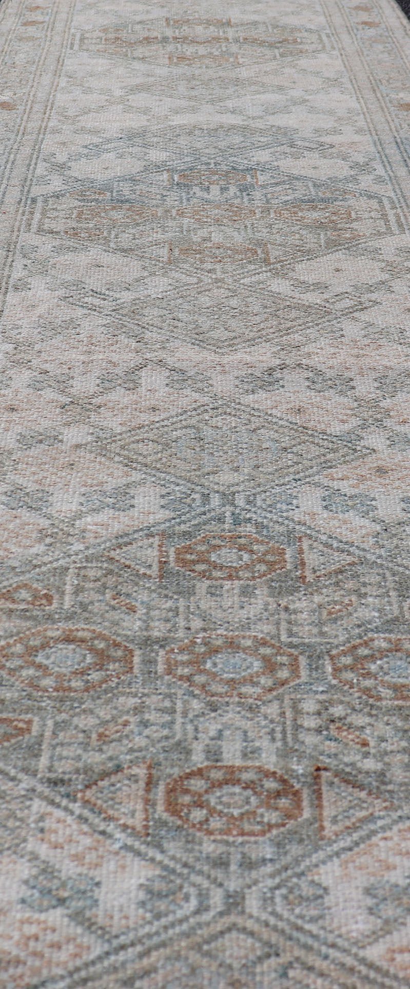 Measures: 2'5 x 9'1 Antique Persian Sarab Runner with Sub - Geometric Design in Light Blue, Tan, Grey. Antique Sarab Runner, rug EMB - 9562 - 13535; Keivan Woven Arts, country of origin / type: Persian / Sarab, circa 1920. This antique hand - knotte... - Keivan Woven ArtsEMB - 9562 - 13535 - 14904Rug