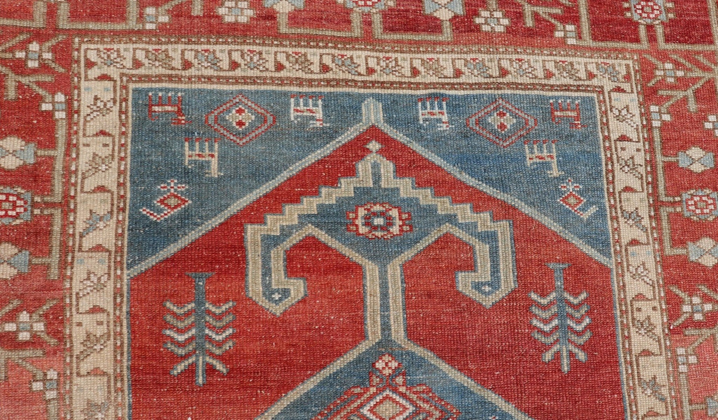 Antique Kurdish Medallion Gallery Runner in Red, Denim Blue, and Eggshell With brilliant design and vibrant colors, this Kurdish medallion - designed gallery runner features a bold burnt red, accompanied by a soft denim blue. Accent motifs of fawn... - Keivan Woven ArtsEMB - 9564 - P13082 - 14916Rug