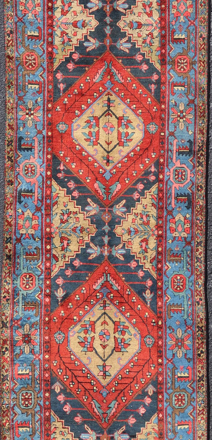 Very Long antique Persian Heriz runner with geometric medallion design in red, blue and colorful tones, Keivan Woven Arts Atlanta / rug EMB - 9571 - P13889 , country of origin / type: Iran / Heriz, circa 1920 Measures: 3 x 14'9 Antique Geome... - Keivan Woven ArtsEMB - 9571 - P13889 - 14958Rug
