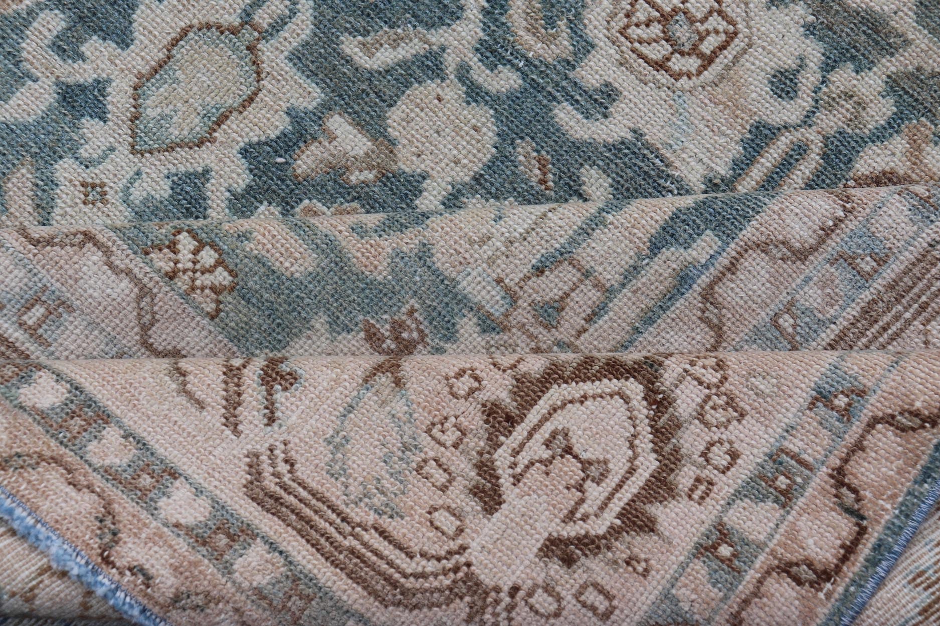 All - Over Light Green Floral Antique Persian Hamadan Rug with Earthy Tones Measures: 7'0 x 9'10 This antique persian Hamadan displaying a light green background with a cream border. The design is floral, the center having a tight and busy... - Keivan Woven ArtsEMB - 9574 - P13891 - 14970Rug
