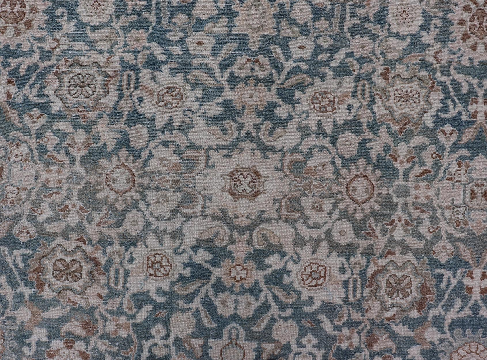 All - Over Light Green Floral Antique Persian Hamadan Rug with Earthy Tones Measures: 7'0 x 9'10 This antique persian Hamadan displaying a light green background with a cream border. The design is floral, the center having a tight and busy... - Keivan Woven ArtsEMB - 9574 - P13891 - 14970Rug