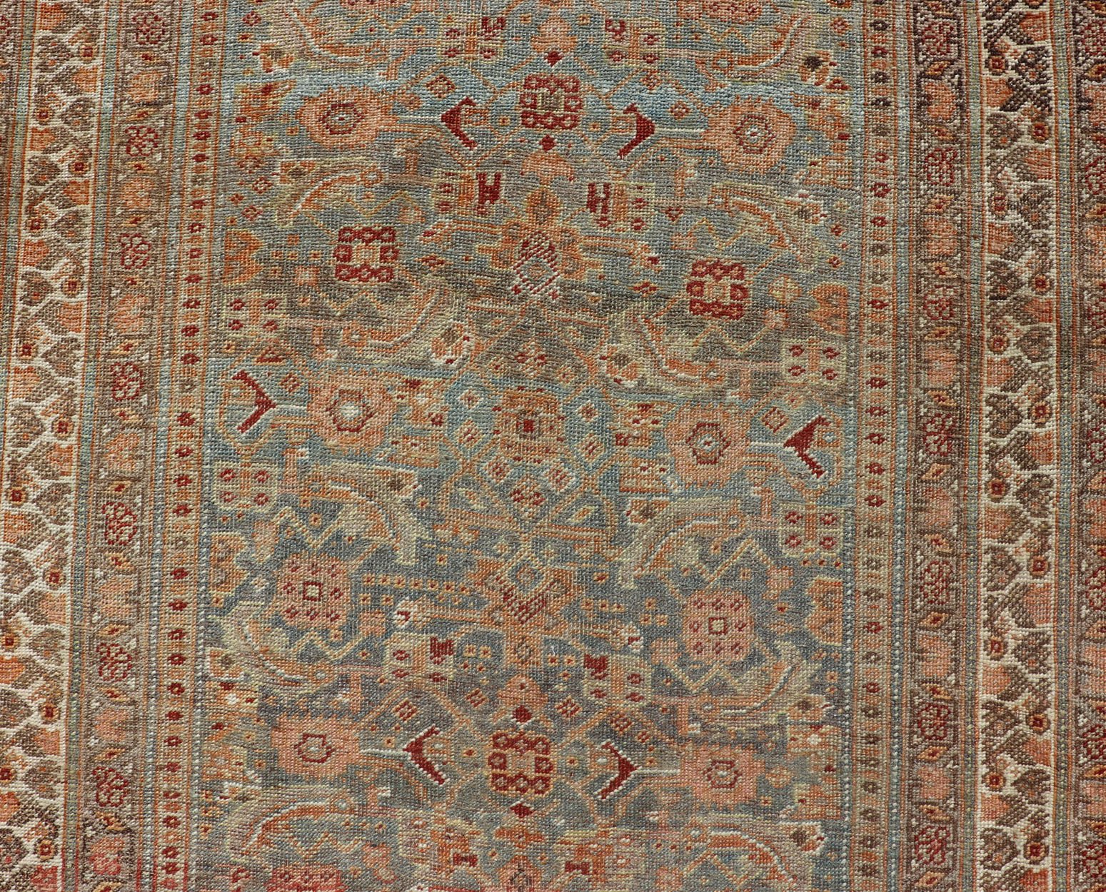 Amazing Antique Persian Bidjar Runner with Herati Design in Lt. Blue, Lt. Gray, taupe green & Red This stunning antique Bidjar rug (circa 1900s) features an all - over design featuring Herati patterns and sub - geometric motifs laid upon a Blue ba... - Keivan Woven ArtsEMB - 9575 - P13088 - 14976Rug