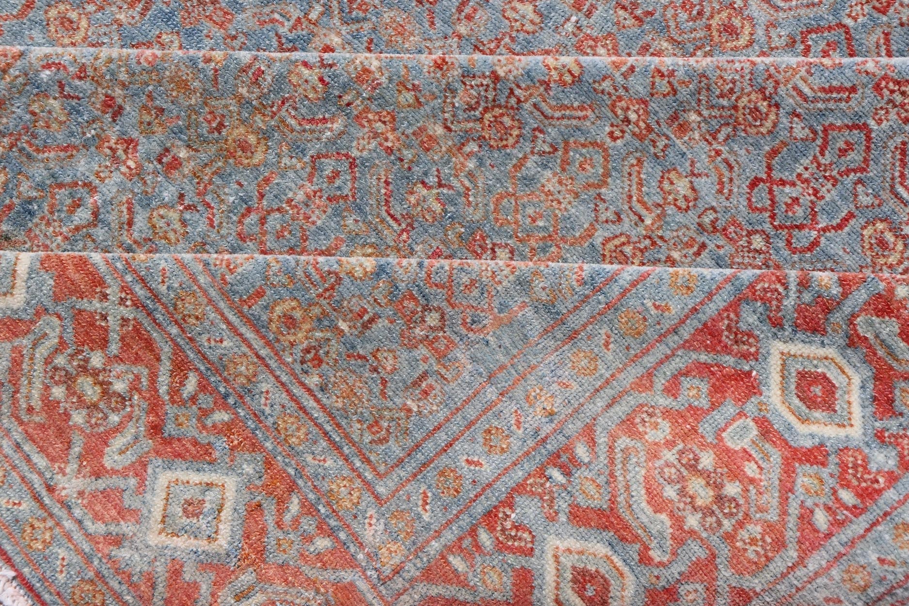 Hand - Knotted Antique Persian Long Gallery Senneh in Wool with All - Over Design This antique Persian long gallery Senneh rug has been hand - knotted in wool. The rug features an all - over sub - geometric design, set upon a blue background. The rug has ... - Keivan Woven ArtsEMB - 9582 - P13876 - 15158Rug