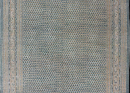 Hand - Knotted Antique Persian Tabriz Rug in Wool with Minimalist Design This Tabriz rug features a relatively intricate and detailed border area and an entirely sparse and small repeating tribal motif in the center field. The tones of this charm... - Keivan Woven ArtsEMB - 9583 - P13517 - 15164Rug