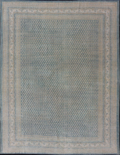 Hand - Knotted Antique Persian Tabriz Rug in Wool with Minimalist Design This Tabriz rug features a relatively intricate and detailed border area and an entirely sparse and small repeating tribal motif in the center field. The tones of this charm... - Keivan Woven ArtsEMB - 9583 - P13517 - 15164Rug