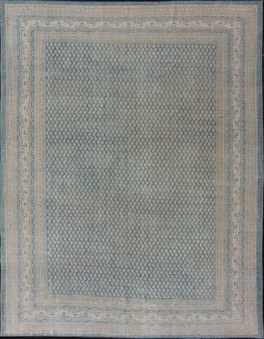Hand - Knotted Antique Persian Tabriz Rug in Wool with Minimalist Design This Tabriz rug features a relatively intricate and detailed border area and an entirely sparse and small repeating tribal motif in the center field. The tones of this charm... - Keivan Woven ArtsEMB - 9583 - P13517 - 15164Rug