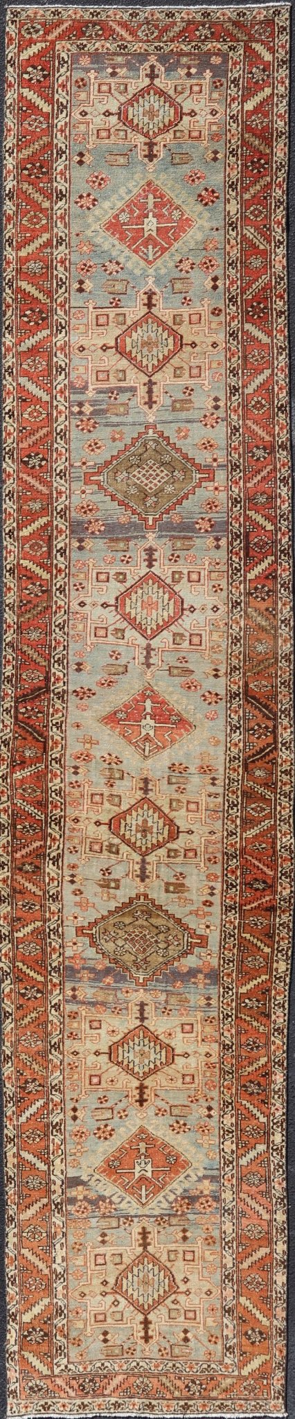 Multi Colored Long Antique Persian Heriz Runner with Geometric Medallions. Keivan Woven Arts / rug EMB - 9588 - P13575, country of origin / type: Iran / Heriz, circa 1910 This magnificent Heriz Serapi runner woven in the early 20th century bears an ... - Keivan Woven ArtsEMB - 9588 - P13575 - 15190Rug