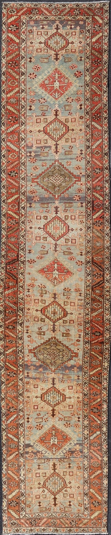 Multi Colored Long Antique Persian Heriz Runner with Geometric Medallions. Keivan Woven Arts / rug EMB - 9588 - P13575, country of origin / type: Iran / Heriz, circa 1910 This magnificent Heriz Serapi runner woven in the early 20th century bears an ... - Keivan Woven ArtsEMB - 9588 - P13575 - 15190