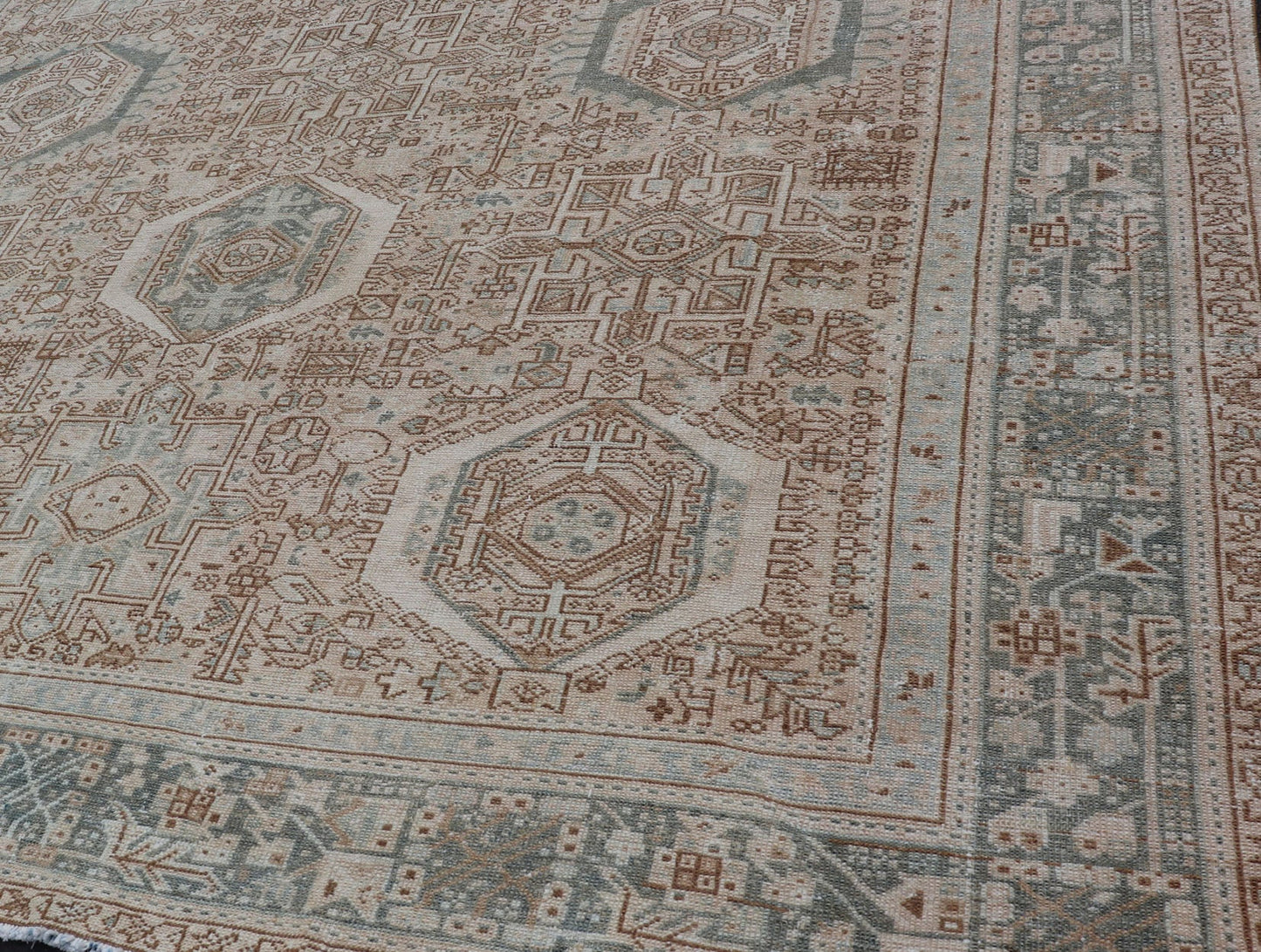 Midcentury Hand Knotted Persian Heriz carpet with layered Medallion and Motifs, rug EMB - 9590 - P13582, country of origin / type: Iran / Heriz, circa mid - 20th century Measures: 9'4 x 12'10 Vintage Persian Heriz Rug with All - Over Med... - Keivan Woven ArtsEMB - 9590 - P13582 - 15202Rug