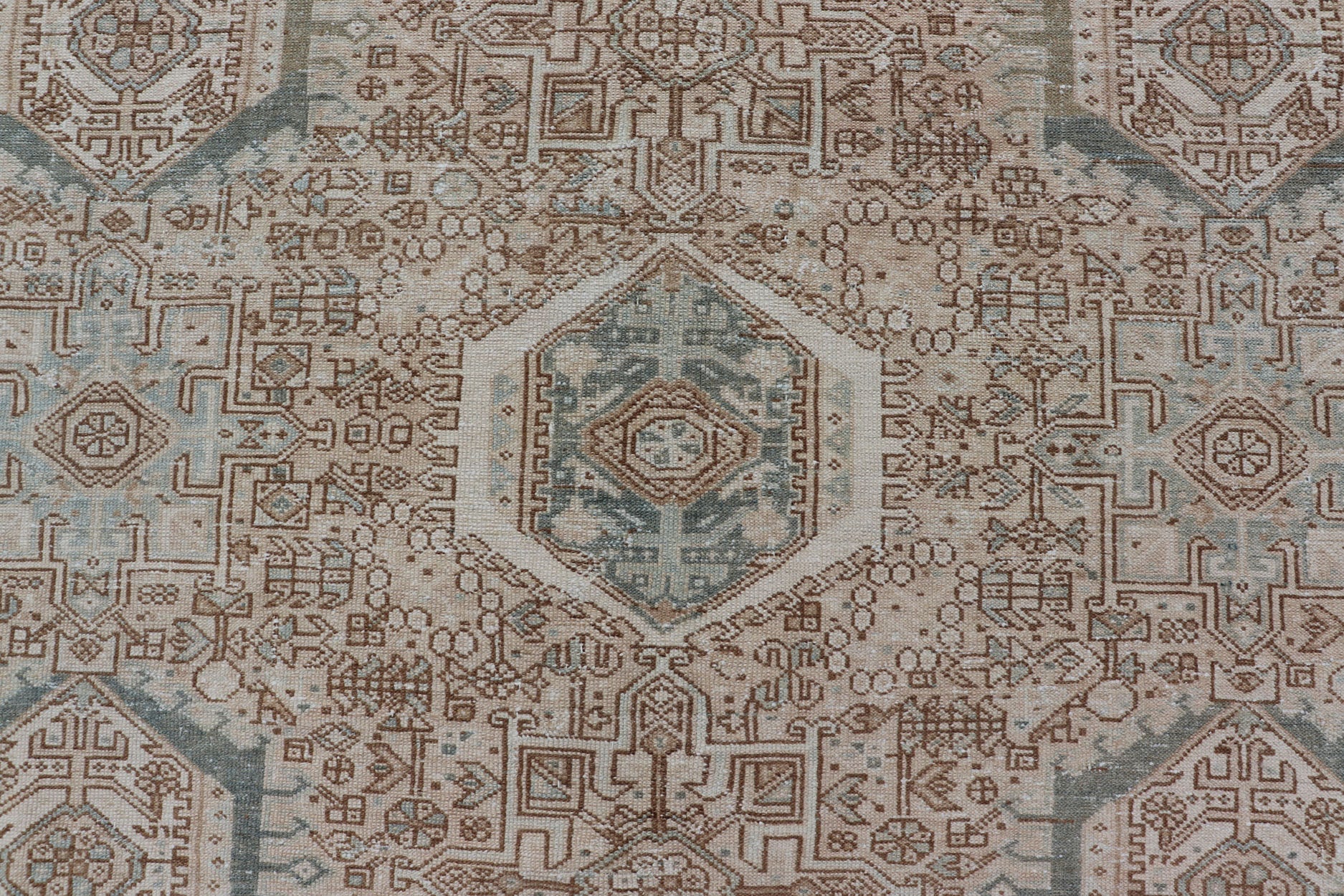 Midcentury Hand Knotted Persian Heriz carpet with layered Medallion and Motifs, rug EMB - 9590 - P13582, country of origin / type: Iran / Heriz, circa mid - 20th century Measures: 9'4 x 12'10 Vintage Persian Heriz Rug with All - Over Med... - Keivan Woven ArtsEMB - 9590 - P13582 - 15202Rug