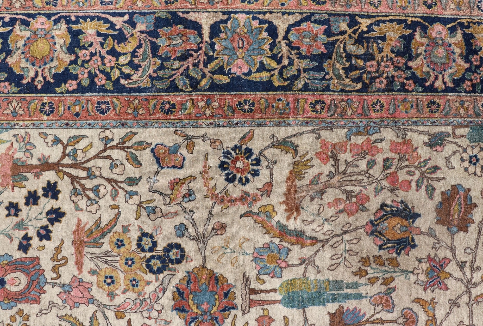 Antique Tabriz with All - Over Floral Sub - Geometric Design & Complementary Border This stunning Antique Tabriz rug (circa 1920s) features a lovely all - over floral design rendered in gold, coral, shades of blue, and pink set upon an Ivory backgroun... - Keivan Woven ArtsEMB - 9593 - P13518 - 15607Rug