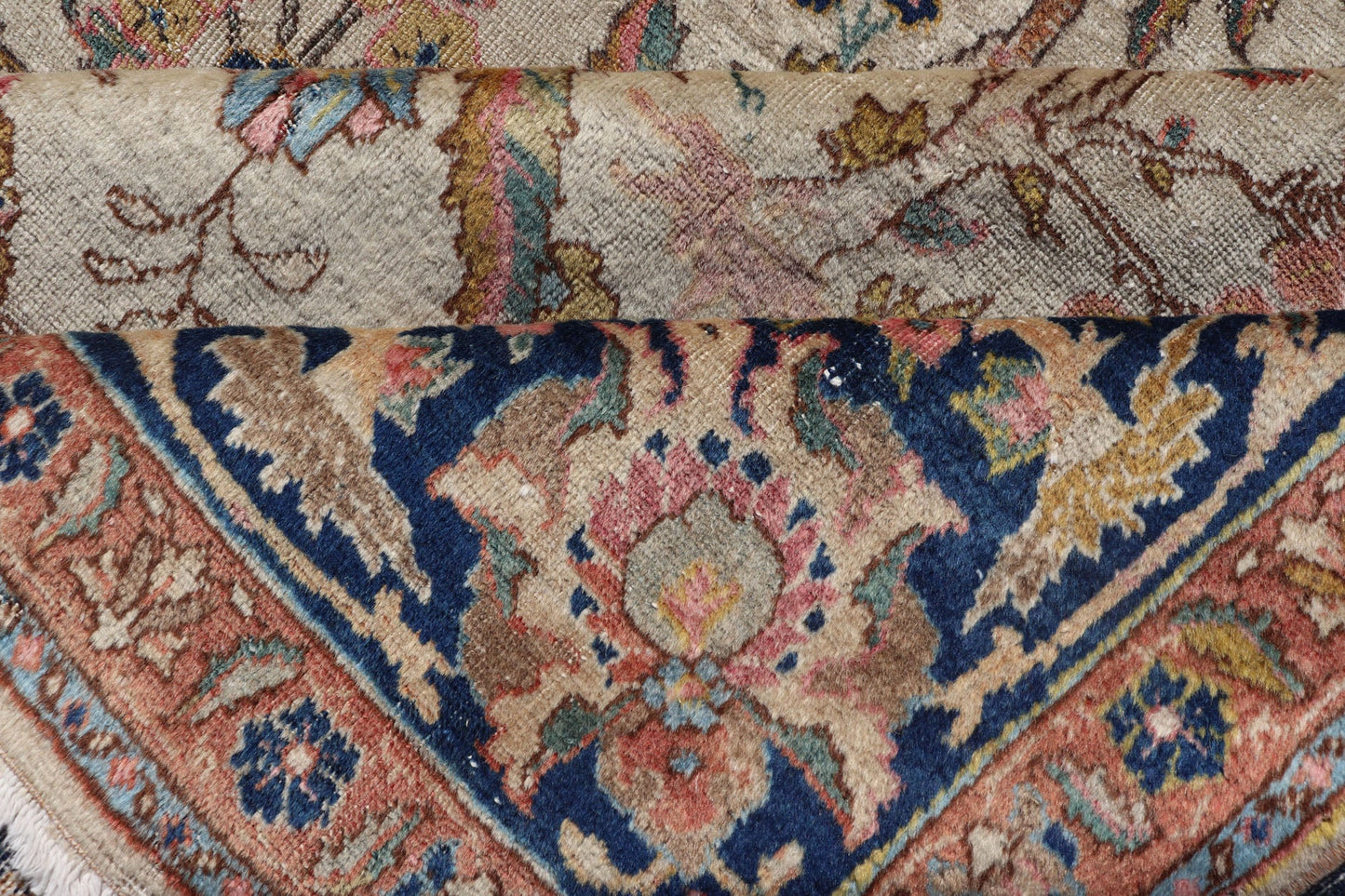Antique Tabriz with All - Over Floral Sub - Geometric Design & Complementary Border This stunning Antique Tabriz rug (circa 1920s) features a lovely all - over floral design rendered in gold, coral, shades of blue, and pink set upon an Ivory backgroun... - Keivan Woven ArtsEMB - 9593 - P13518 - 15607Rug
