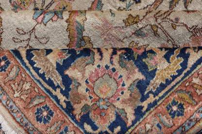Antique Tabriz with All - Over Floral Sub - Geometric Design & Complementary Border This stunning Antique Tabriz rug (circa 1920s) features a lovely all - over floral design rendered in gold, coral, shades of blue, and pink set upon an Ivory backgroun... - Keivan Woven ArtsEMB - 9593 - P13518 - 15607Rug