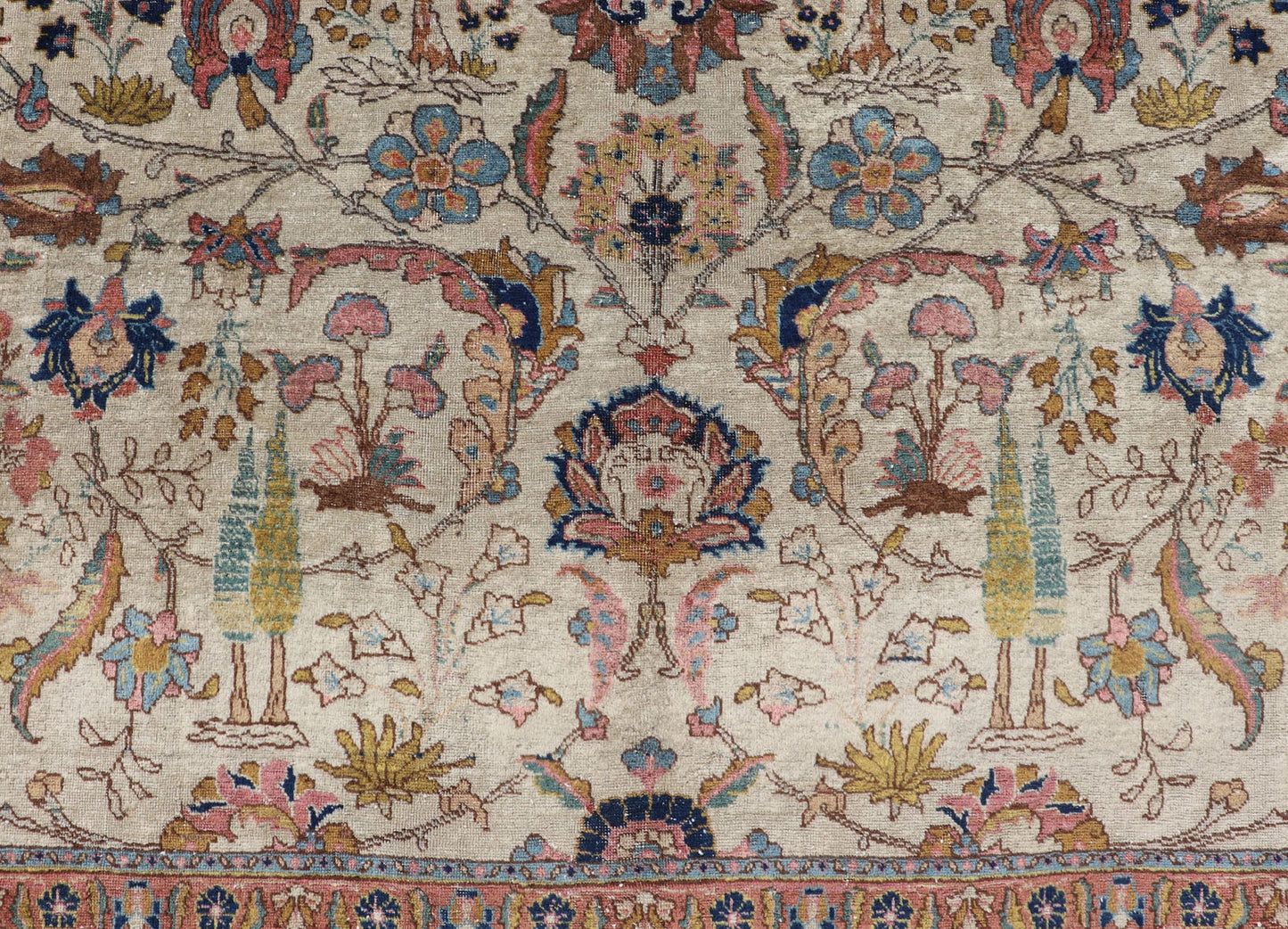 Antique Tabriz with All - Over Floral Sub - Geometric Design & Complementary Border This stunning Antique Tabriz rug (circa 1920s) features a lovely all - over floral design rendered in gold, coral, shades of blue, and pink set upon an Ivory backgroun... - Keivan Woven ArtsEMB - 9593 - P13518 - 15607Rug