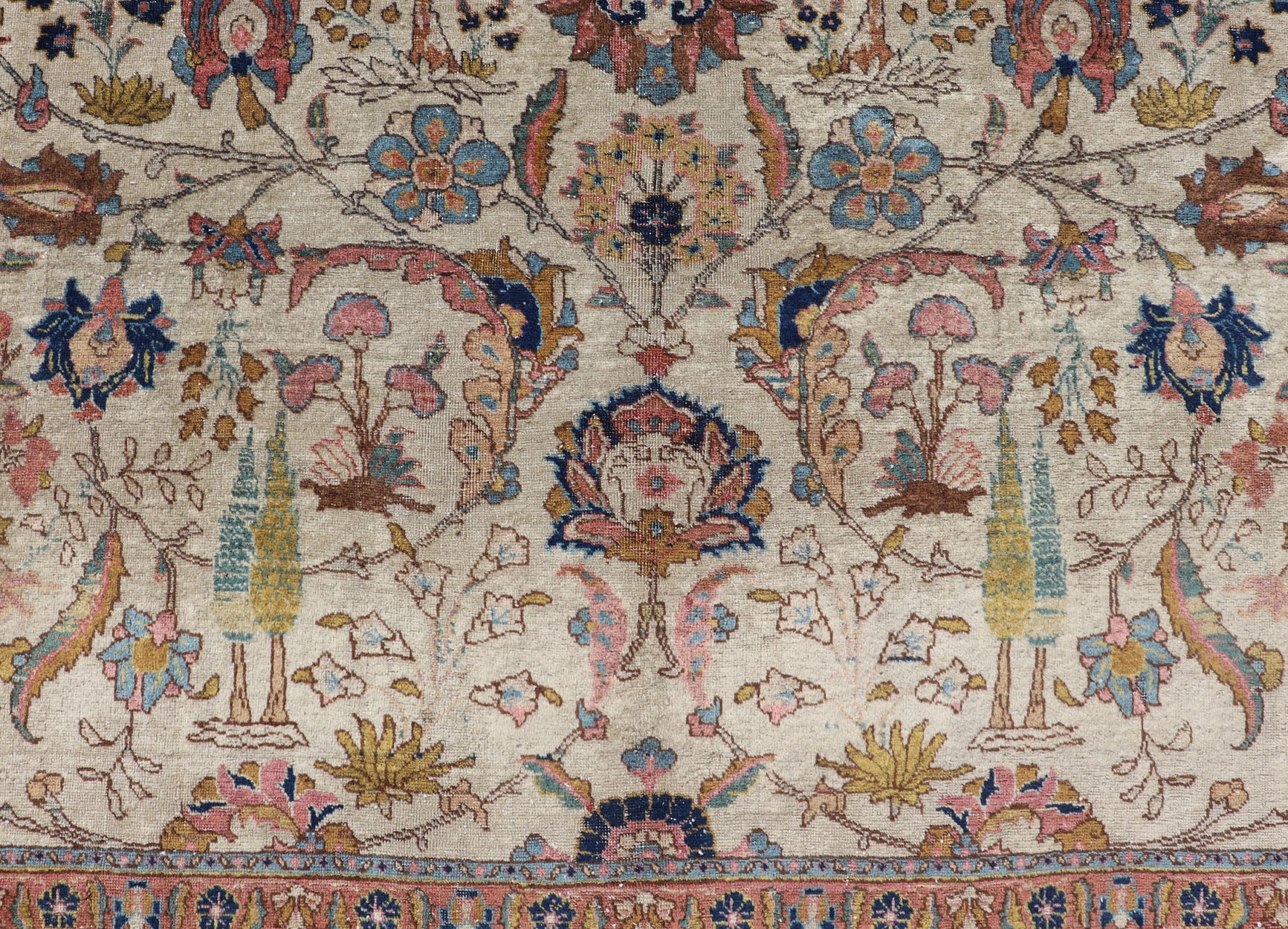 Antique Tabriz with All - Over Floral Sub - Geometric Design & Complementary Border This stunning Antique Tabriz rug (circa 1920s) features a lovely all - over floral design rendered in gold, coral, shades of blue, and pink set upon an Ivory backgroun... - Keivan Woven ArtsEMB - 9593 - P13518 - 15607Rug