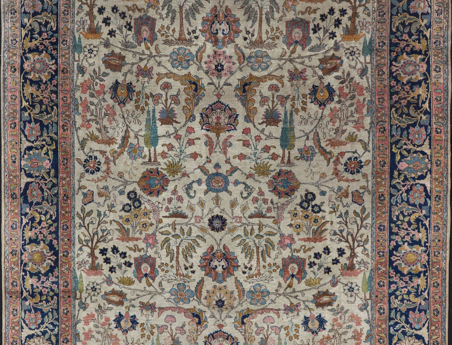 Antique Tabriz with All - Over Floral Sub - Geometric Design & Complementary Border This stunning Antique Tabriz rug (circa 1920s) features a lovely all - over floral design rendered in gold, coral, shades of blue, and pink set upon an Ivory backgroun... - Keivan Woven ArtsEMB - 9593 - P13518 - 15607Rug