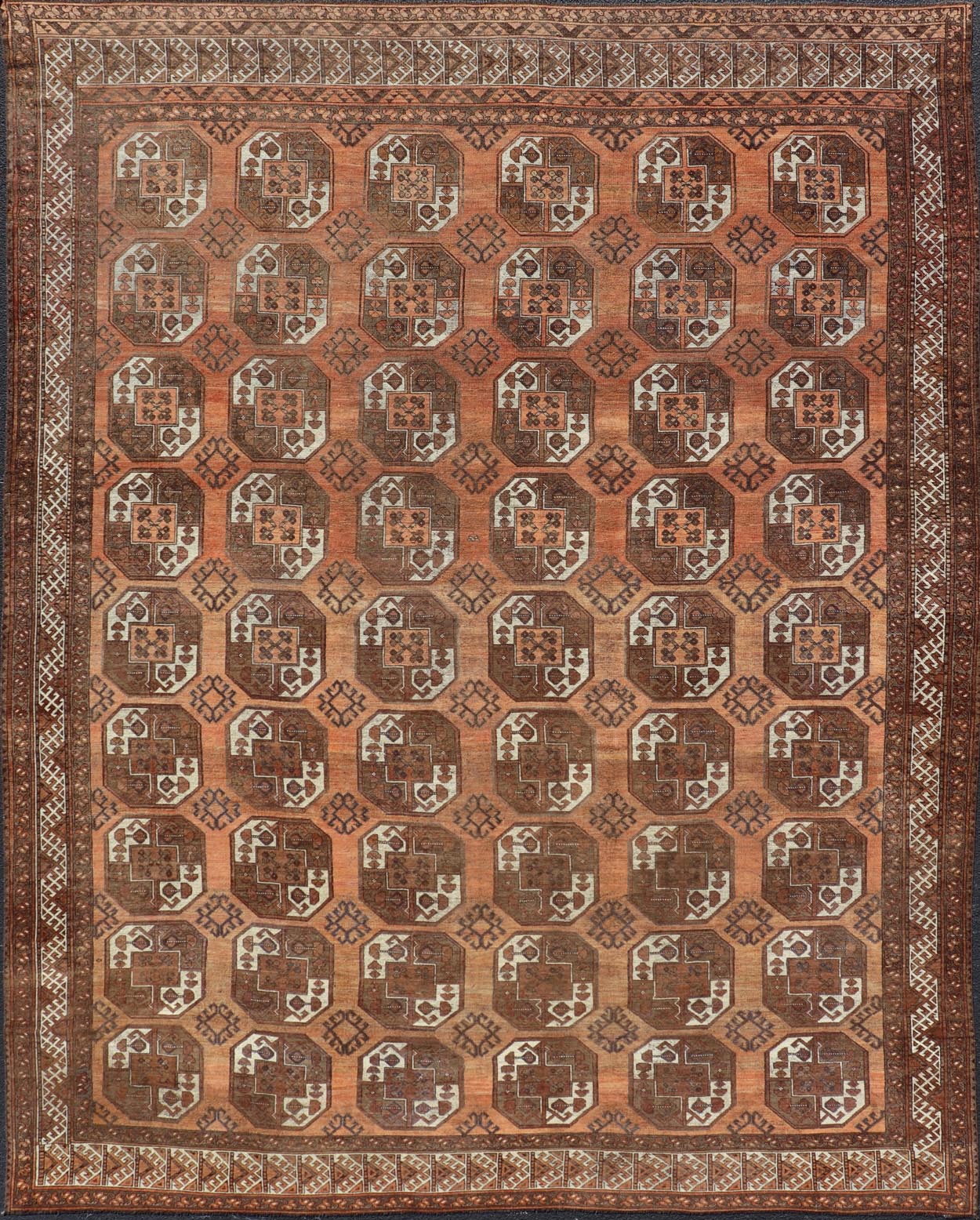 Measures:9'7 x 12'10 Antique Turkomen Ersari Rug in Wool with Repeating Gul Design in Orange, Brown. Keivan Woven Arts; rug EMB - 9594 - 13519, country of origin / type: Turkestan / Ersari, circa 1930s. This Ersari rug has been hand - knotted in th... - Keivan Woven ArtsEMB - 9594 - 13519 - 15613Rug