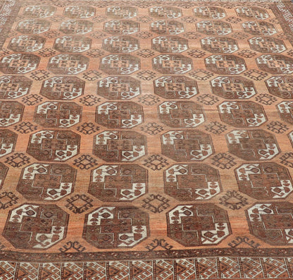 Measures:9'7 x 12'10 Antique Turkomen Ersari Rug in Wool with Repeating Gul Design in Orange, Brown. Keivan Woven Arts; rug EMB - 9594 - 13519, country of origin / type: Turkestan / Ersari, circa 1930s. This Ersari rug has been hand - knotted in th... - Keivan Woven ArtsEMB - 9594 - 13519 - 15613Rug
