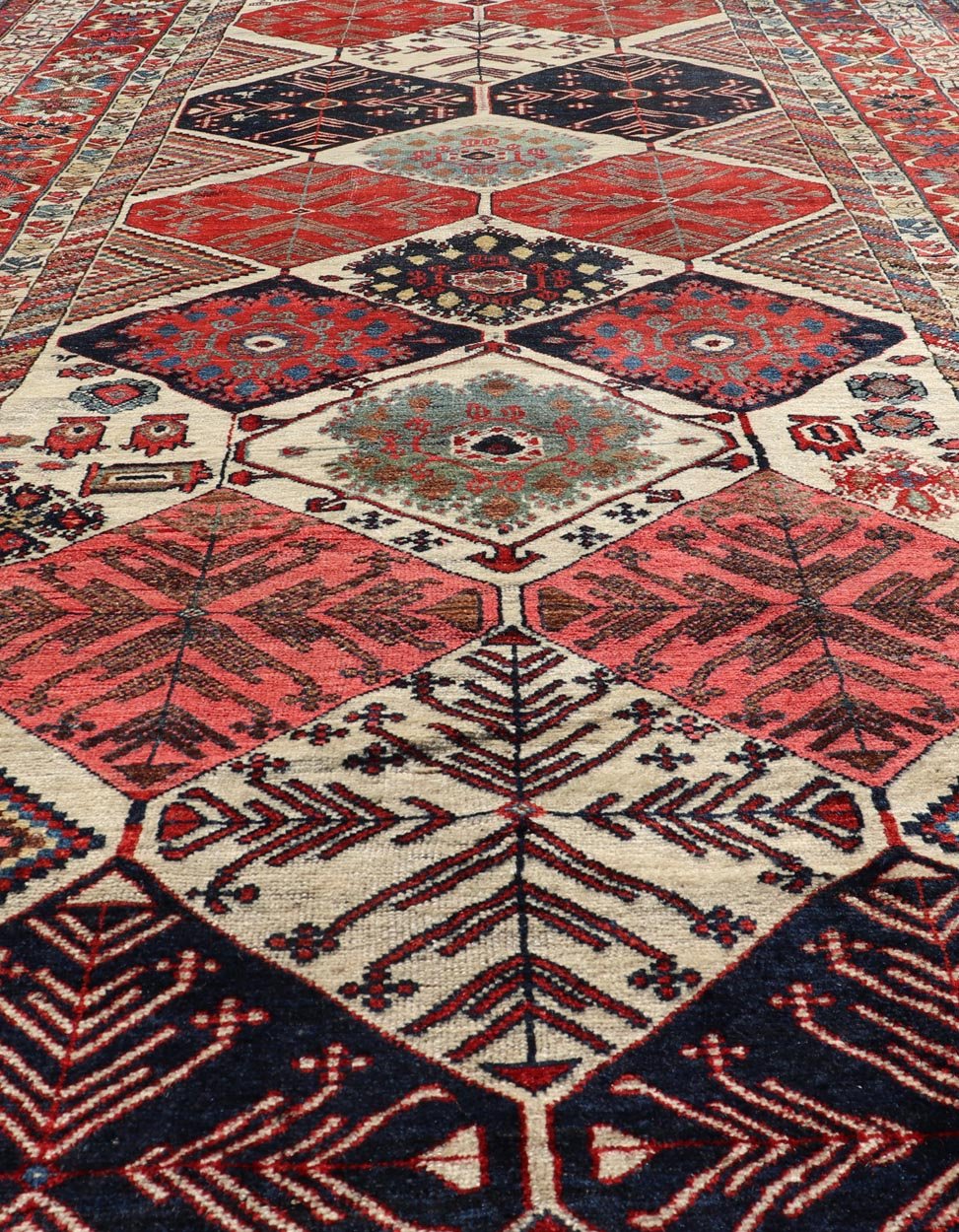 Antique Hand - Knotted Persian Bakhtiari Gallery Rug in Wool with Diamond Design This antique Persian Bakhtiari rug has been hand - knotted in wool and features an all - over sub - geometric diamond design rendered in multicolor, set upon an ivory bac... - Keivan Woven ArtsEMB - 9595 - P13521 - 15619Rug