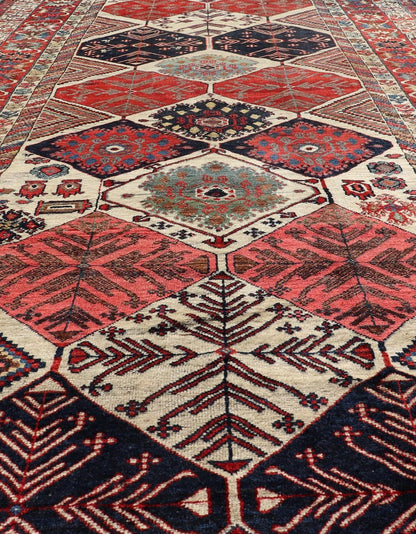 Antique Hand - Knotted Persian Bakhtiari Gallery Rug in Wool with Diamond Design This antique Persian Bakhtiari rug has been hand - knotted in wool and features an all - over sub - geometric diamond design rendered in multicolor, set upon an ivory bac... - Keivan Woven ArtsEMB - 9595 - P13521 - 15619Rug
