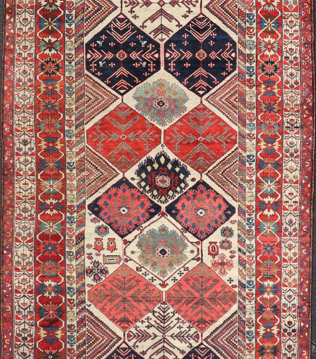 Antique Hand - Knotted Persian Bakhtiari Gallery Rug in Wool with Diamond Design This antique Persian Bakhtiari rug has been hand - knotted in wool and features an all - over sub - geometric diamond design rendered in multicolor, set upon an ivory bac... - Keivan Woven ArtsEMB - 9595 - P13521 - 15619Rug