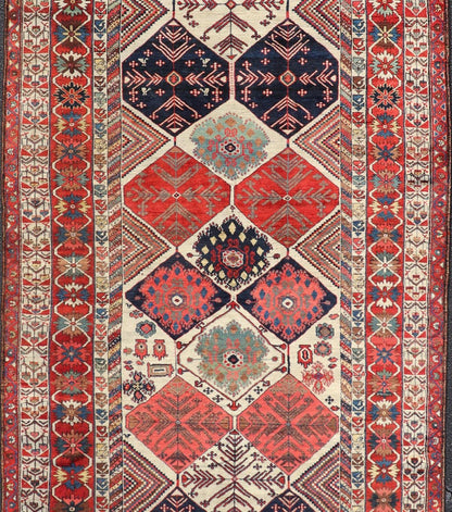 Antique Hand - Knotted Persian Bakhtiari Gallery Rug in Wool with Diamond Design This antique Persian Bakhtiari rug has been hand - knotted in wool and features an all - over sub - geometric diamond design rendered in multicolor, set upon an ivory bac... - Keivan Woven ArtsEMB - 9595 - P13521 - 15619Rug