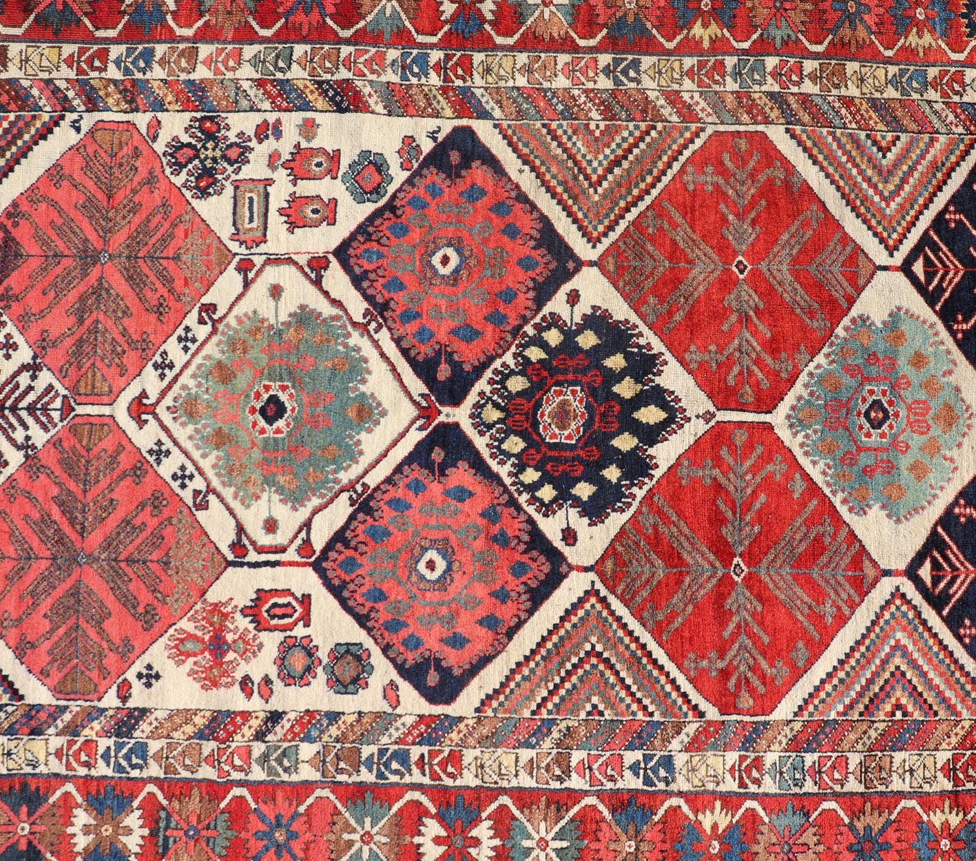 Antique Hand - Knotted Persian Bakhtiari Gallery Rug in Wool with Diamond Design This antique Persian Bakhtiari rug has been hand - knotted in wool and features an all - over sub - geometric diamond design rendered in multicolor, set upon an ivory bac... - Keivan Woven ArtsEMB - 9595 - P13521 - 15619Rug