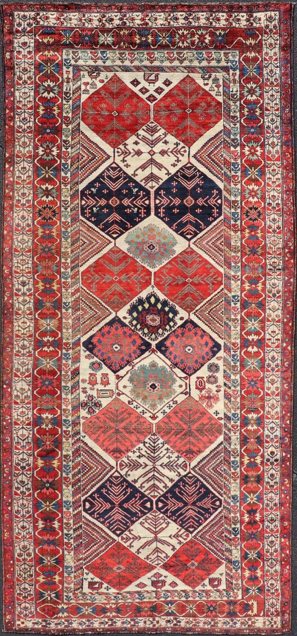 Antique Hand - Knotted Persian Bakhtiari Gallery Rug in Wool with Diamond Design This antique Persian Bakhtiari rug has been hand - knotted in wool and features an all - over sub - geometric diamond design rendered in multicolor, set upon an ivory bac... - Keivan Woven ArtsEMB - 9595 - P13521 - 15619Rug